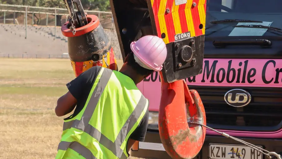 Picture of a crane operator working with rigging equipment
